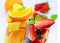 axicorp Gesundheitsthemen Glas mit Früchten